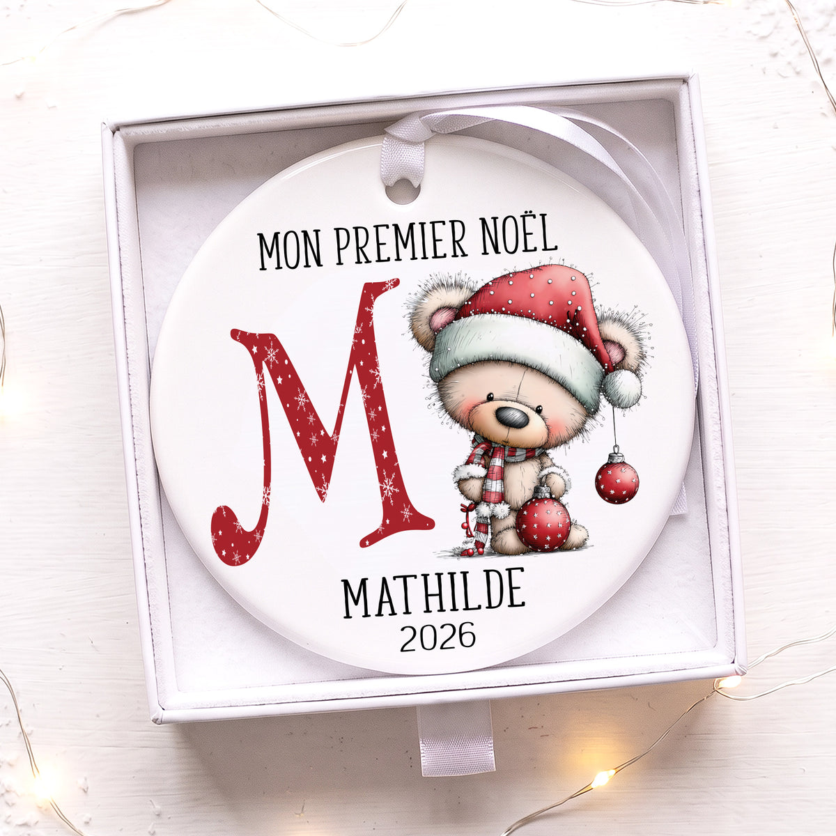Ornement en céramique personnalisé avec le prénom de bébé pour son premier Noël